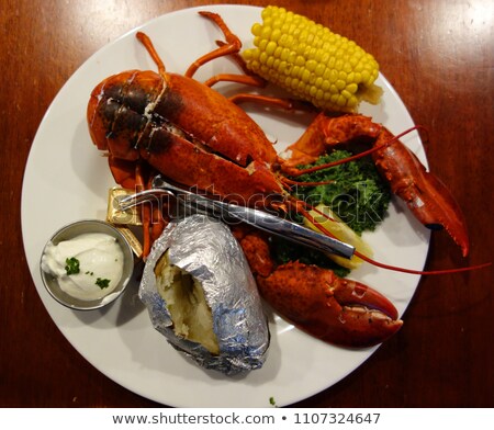 Stok fotoğraf: Boiled Lobster Dinner With Clams And Corn