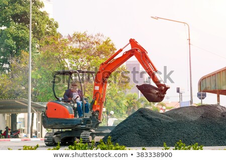 Stok fotoğraf: Excavator Loader Machine During Earthmoving Works Outdoors At Co