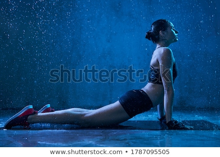 Foto stock: Odelo · de · ropa · interior · y · luces · azules