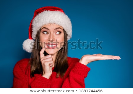 Stock photo: Woman In A Santa Cap