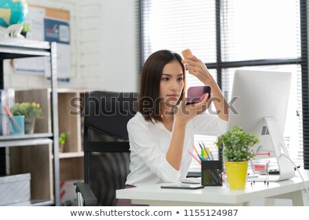 [[stock_photo]]: Make Up Girl During Her Job