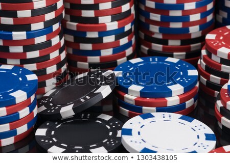 Stock photo: Dealer Collects Red Poker Chips