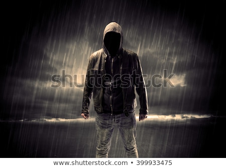 Stock photo: Spooky Evil Criminal Person With Hooded Jacket In Rain