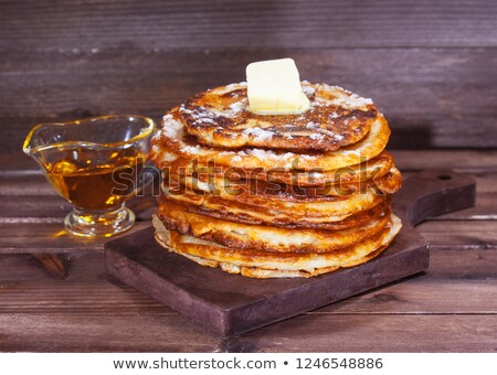 Stock photo: Pancakes With Fresh Berries And Maple Syrup On Dark Background Closeup