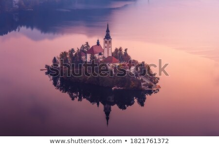 Foto stock: Aerial View Of The Island On Alpine Lake Bled Location Place Ju