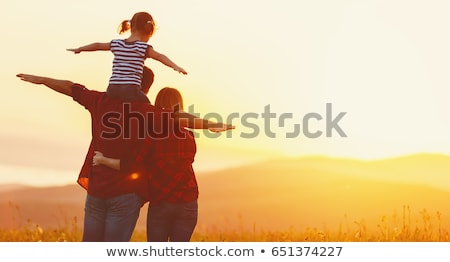 Сток-фото: Happy Family Silhouette At Sunset