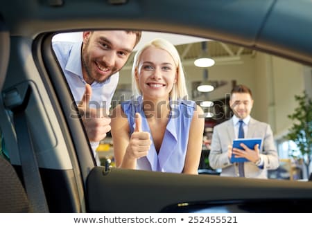 Foto stock: Couple With Tablet Computer Showing Thumbs Up