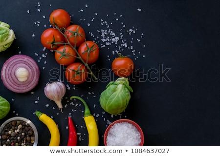 Stockfoto: Banner Of Red Chili Pepper And Parsley On Black Background