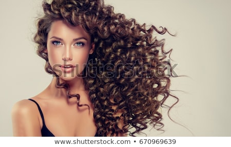 Stockfoto: Woman With Long Brown Curly Hair