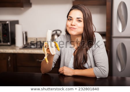 Stock photo: Women Eating Banana