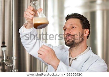 Beer Brewer In Food Laboratory Examining Stockfoto © Kzenon
