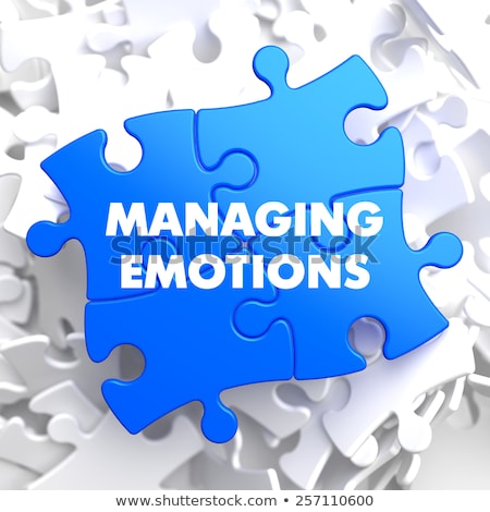 Сток-фото: Managing Emotions On Blue Puzzle