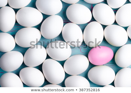 Stock fotó: Large Number Of White Easter Eggs And One Pink One