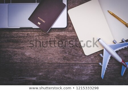 [[stock_photo]]: Open Notebook And Pen On Old Wooden Background