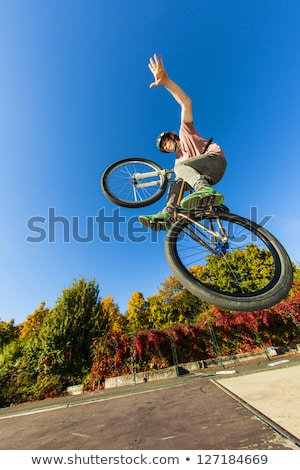 ストックフォト: Boy Going Airborne With His Bike