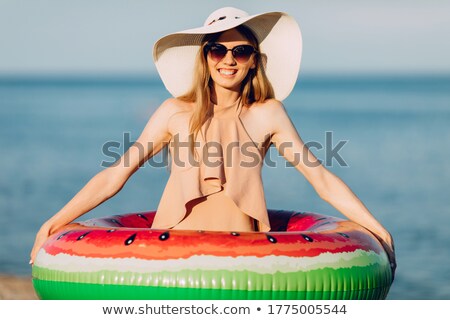 Zdjęcia stock: Delighted Young Woman Dressed In Swimsuit
