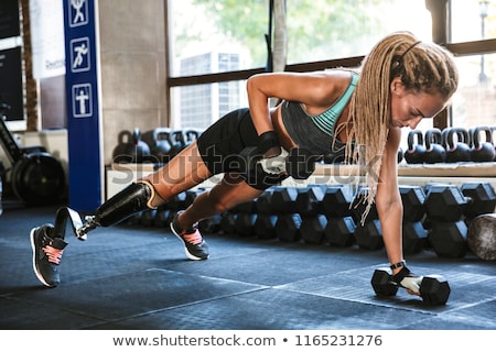 Zdjęcia stock: Portrait Of Fitness Handicapped Sportsgirl With Prosthesis In Tr