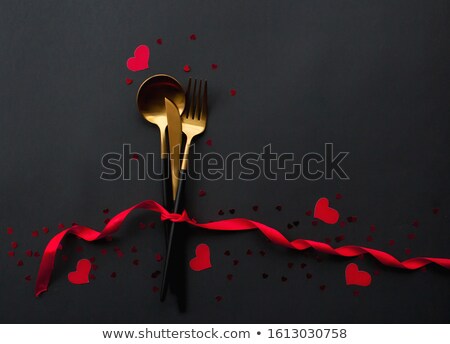 Stock fotó: Two Golden Hearts On Black Background For Valentines Day