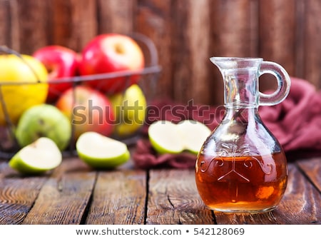 Stok fotoğraf: Bottle And Glass Of Homemade Organic Apple Cider With Fresh Apples In Box On Wooden Background