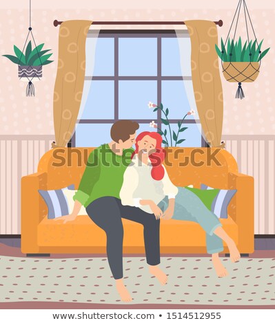 Couple Sit On Sofa With Pillows In Green Room Сток-фото © robuart
