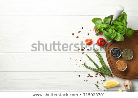 Stockfoto: Herbs On White Wooden Table