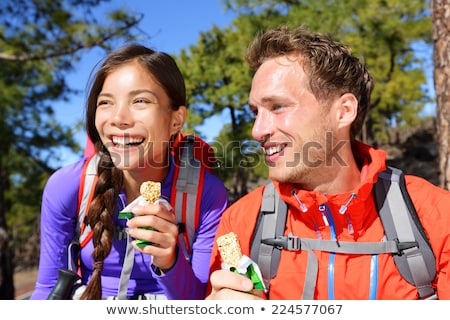 Foto d'archivio: Woman Eating Cereal Outside