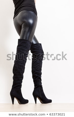 Foto stock: Detail Of Standing Woman Wearing Fashionable Black Boots