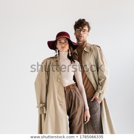 [[stock_photo]]: Fashion Young Couple Posing With Hands In Pockets