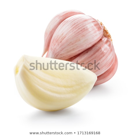 Foto d'archivio: Two Garlic Cloves Isolated On White