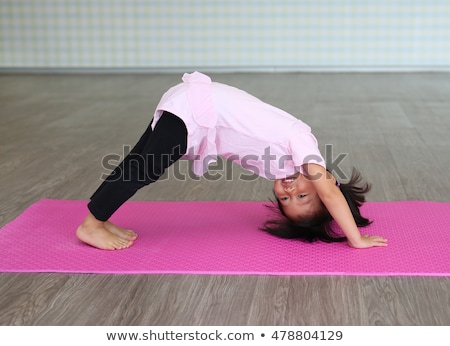 Foto stock: Little Japanese Girl In Gymnastics