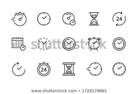 Foto stock: Outline Clock Icon Isolated On White Background
