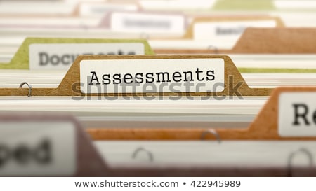 Stok fotoğraf: Folder In Catalog Marked As Assessments