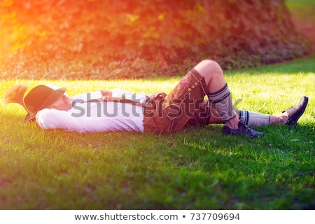 Stock foto: Bavarian Tradition Man In The Grass