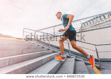 Foto d'archivio: Man Training On Urban Stairs