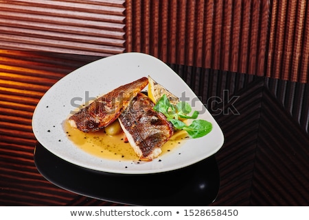 [[stock_photo]]: Grilled Sea Bream Fish Fillet With Spinach