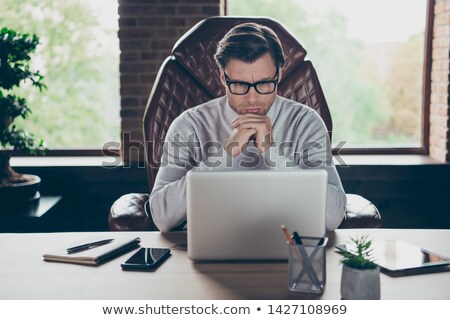 Stock foto: Young Serious Analyst Concentrating Upon Intellectual Work