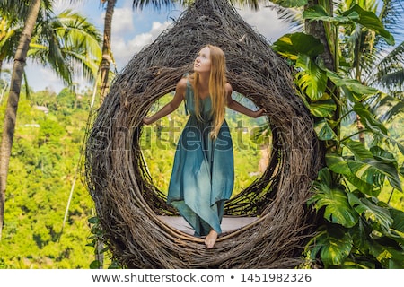 [[stock_photo]]: Bali Trend Straw Nests Everywhere Young Tourist Enjoying Her Travel Around Bali Island Indonesia