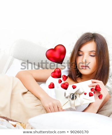 Stockfoto: Young Pretty Attractive Smiling Woman With Heart Lying Relaxed A