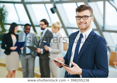 Jeune homme d'affaires [[stock_photo]] © Pressmaster