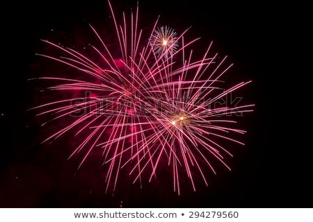 Stock photo: Long Exposure Of Fireworks Against A Black Sky