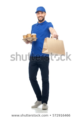 Stock fotó: Happy Delivery Man With Coffee And Food In Bag