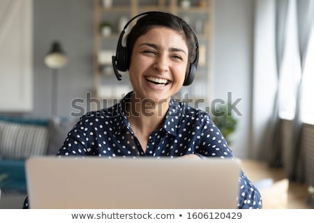 Stock photo: A Woman Wearing A Headset