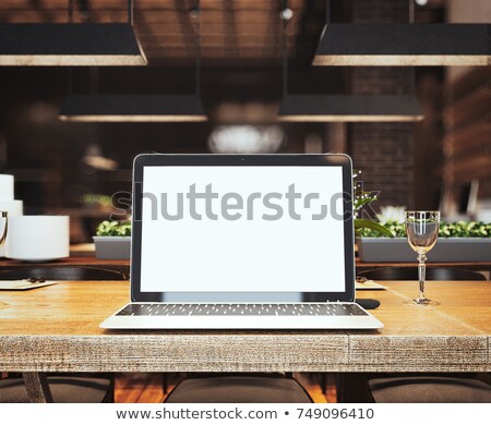 Foto stock: Silver Laptop At The Table In Restaurant 3d Rendering