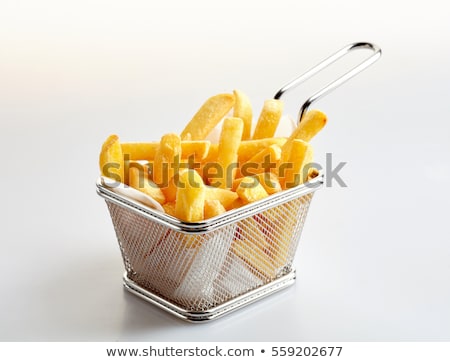 Stok fotoğraf: Basket Of Freshly Made French Fries On White Studio Background