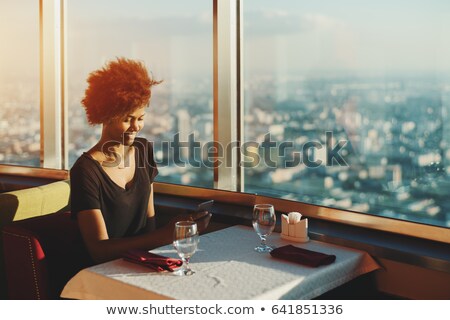 Foto stock: Very Cute And Beautiful Teenager Sitting Near A Window