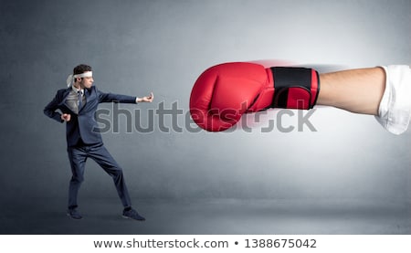 Сток-фото: Little Man Fighting With Big Red Boxing Glove
