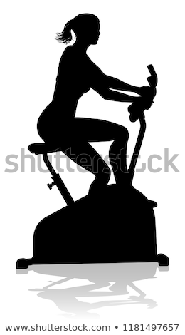 Stock photo: Gym Woman Silhouette Stationary Exercise Spin Bike
