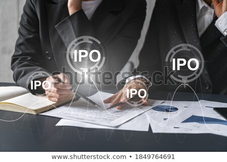Stock foto: Two Businesswoman With With Earnings