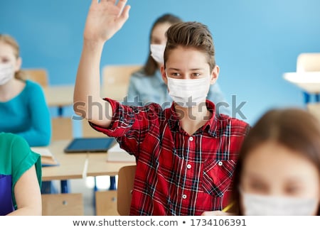 Stock photo: Teenager Boy Wearing Respiratory Protective Medical Mask