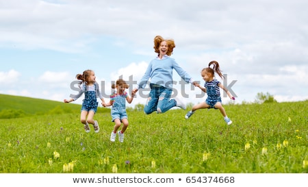 Stock fotó: Jump For Joy Beautiful Girl In Countryside Leaping